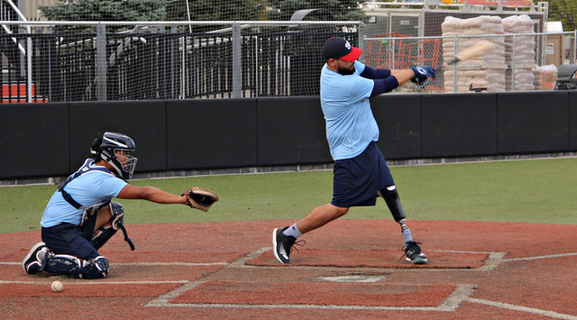 Two Baseball Players Practicing Baseball on Ground