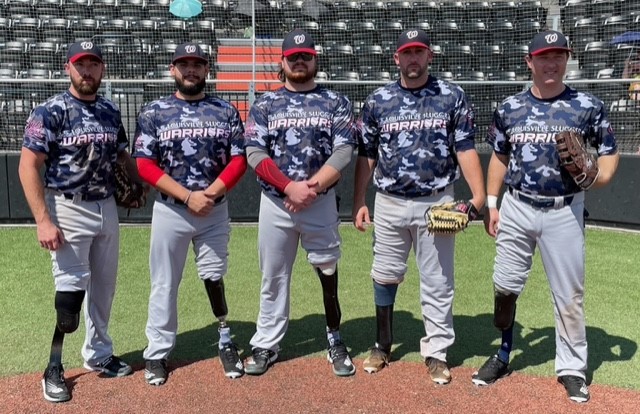 Five Men in Baseball Dress and Prosthetic Leg
